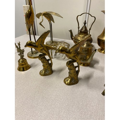 12 - Large collection of brass items to include horse and storks etc.