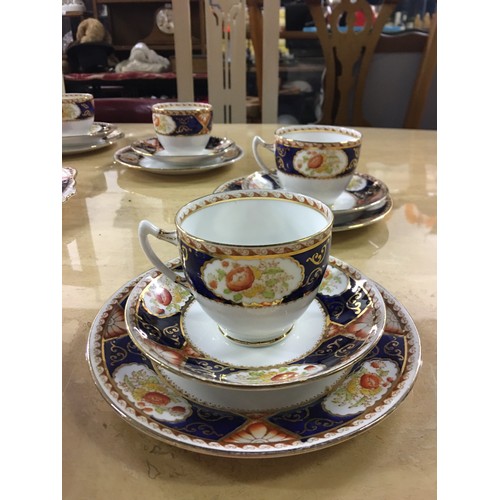 19 - Antique 39 piece Royal Albert Imari dinner set.