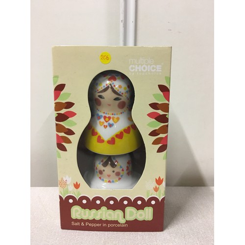 20 - 2 vintage Russian dolls and new Russian Doll salt and peppers.