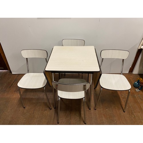 30 - 1960's/70's Belgian Tavo drop-leaf kitchen table and 4 chairs.
Table 108cm l x 75cm h 60cm d