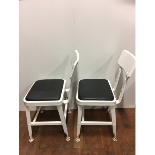 114 - Pair of vintage metal utility chairs.