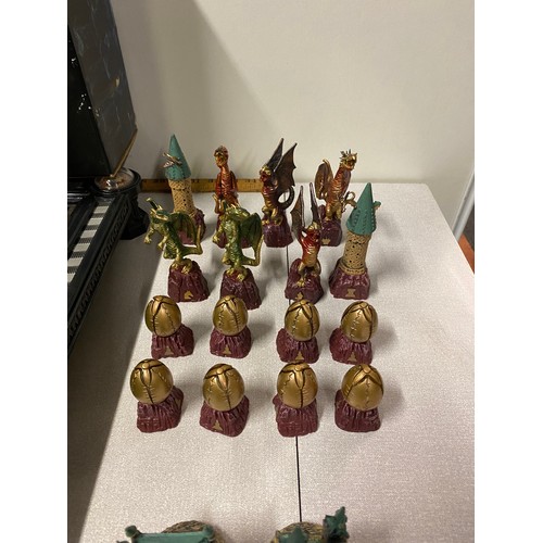 143 - Harry Potter Wizard chess set (with sound)and board along with Harry Potter dragon chess set etc.
53... 