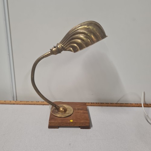 32 - Vintage brass Christopher Wray swan neck clam lamp on wooden base.
42cm h