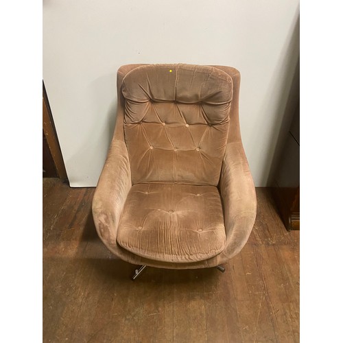 226 - Mid Century egg style swivel chair with velour upholstery.