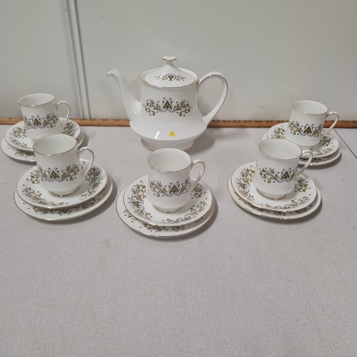 44 - Royal Standard 16 piece tea set to include teapot.