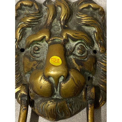 51 - Antique brass lion head door knocker.
20cm l