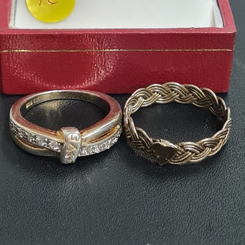 328 - 2 hallmarked silver rings & man utd earing