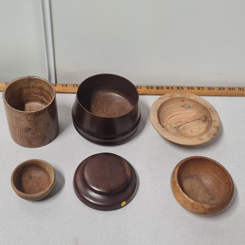 288 - Selection of carved wooden bowls and tea caddie.