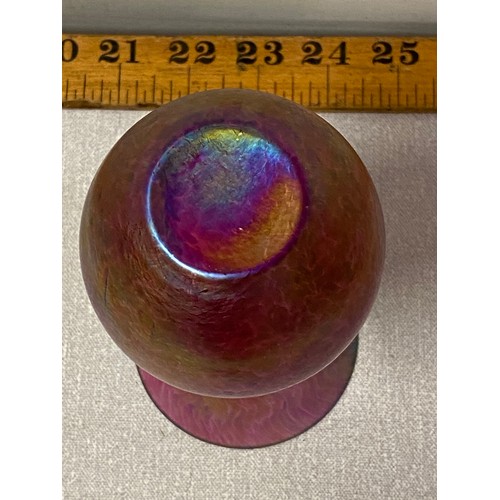 390 - Iridescent art glass vase.
16cm tall