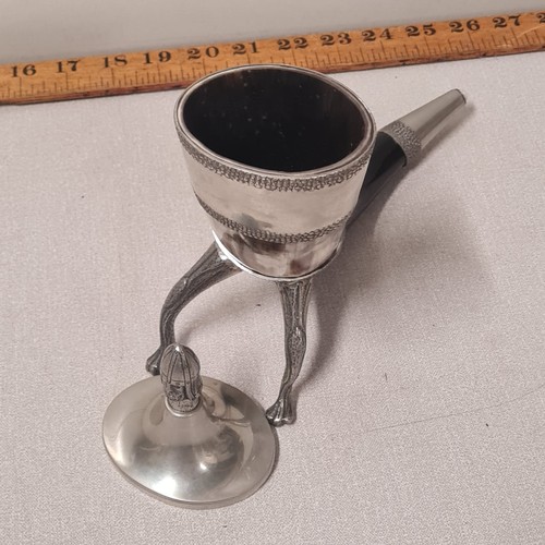 145 - 1960's Norwegian pewter drinking horn with lid on 2 legs.
23cm l