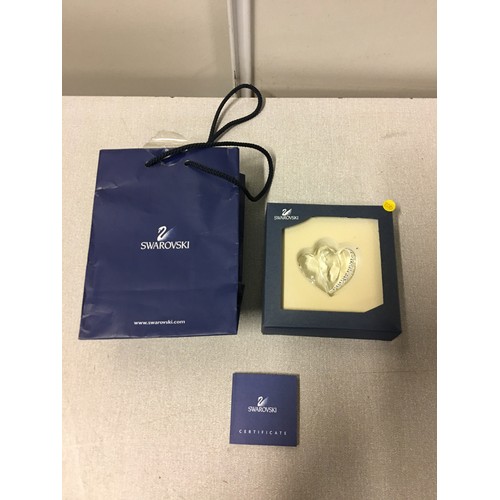 11 - Boxed Swarovski double heart paperweight with certificate and bag.