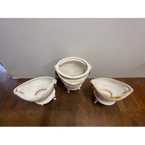 157 - 3 x large porcelain planters on stands.
Largest 48cm h 38cm diameter