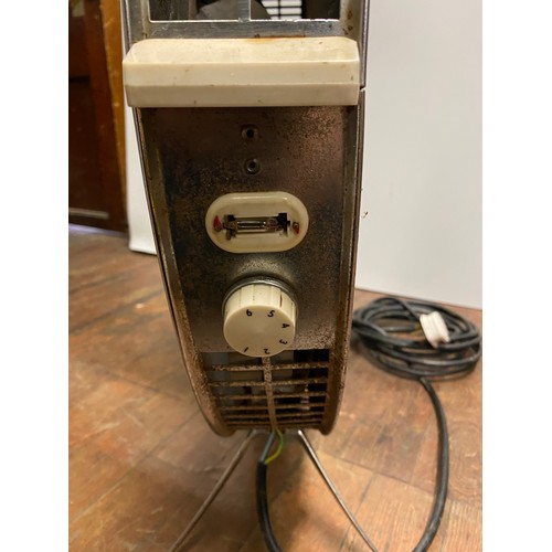 234 - Vintage Sofono spacemaster heater.
68cm tall