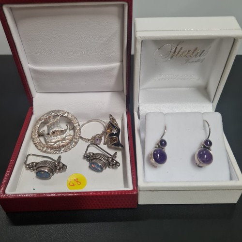 575 - Selection of silver jewellery to include earrings, ring, charm and Viking brooch.