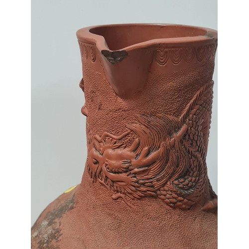 76 - Antique Japanese Tokoname Redware Pottery Dragon Vase. Marked to base. chip to the spout.
26cm h