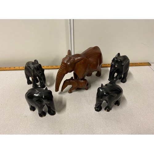 16 - Collection of carved wooden elephant ornaments.
Largest 17cm h