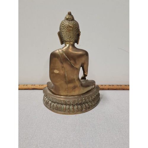 5 - Brass Buddha statue.
20cm h