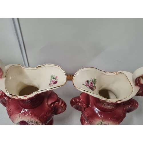 32 - Pair of large pink Staffordshire jugs.
39cm h