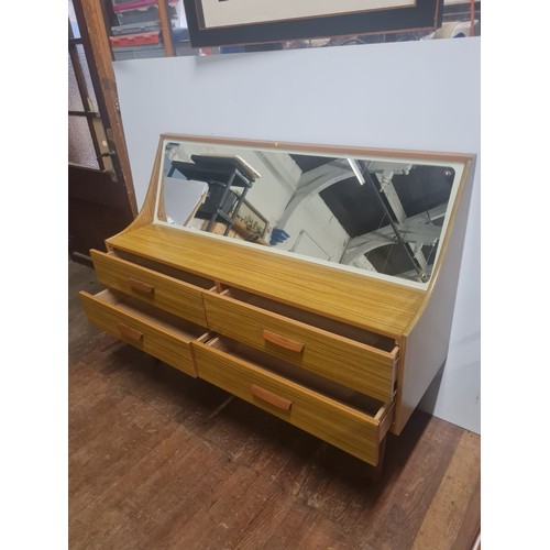 137 - Mid-century 4 drawer mirror back sideboard.
95cm h x 124cm l x 44cm d