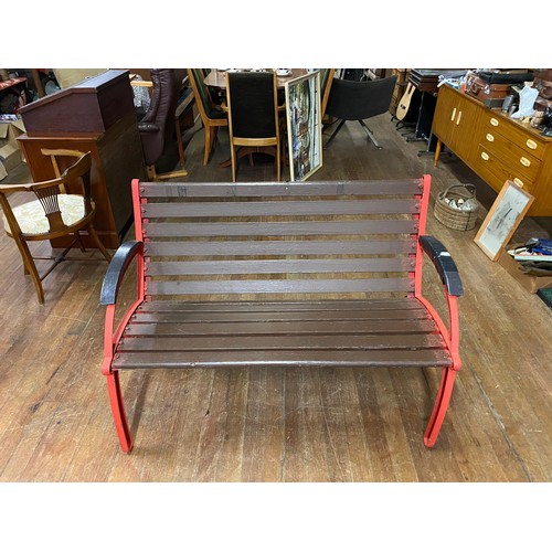 141 - Garden bench with painted metal ends.