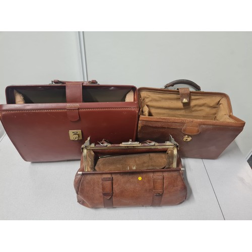 210 - 2 vintage leather briefcases and leather doctors bag.