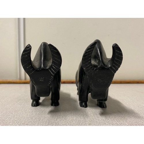 263 - pair of vintage soap stone bulls