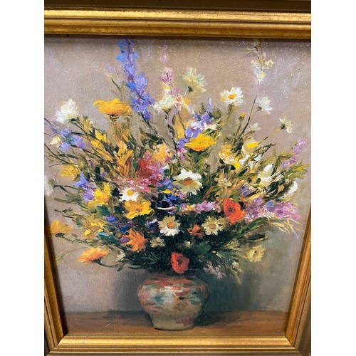 307 - 2 gilt framed oil paintings of vases of flowers
37cm x 41cm