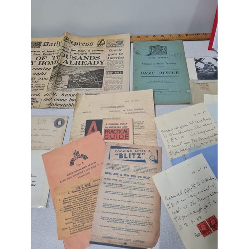 236 - Selection of war items to include WW2 air force photographs, armed forces money, coupons and letters... 