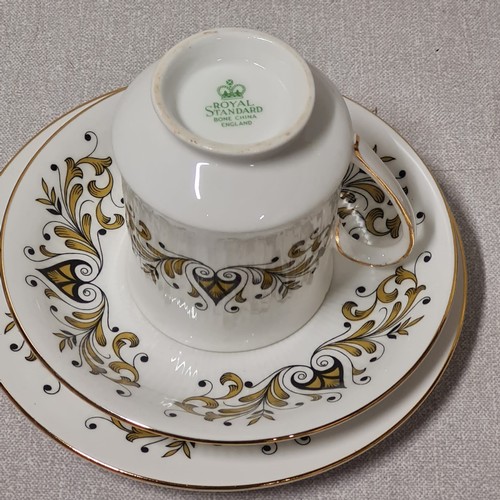 44 - Royal Standard 16 piece tea set to include teapot.