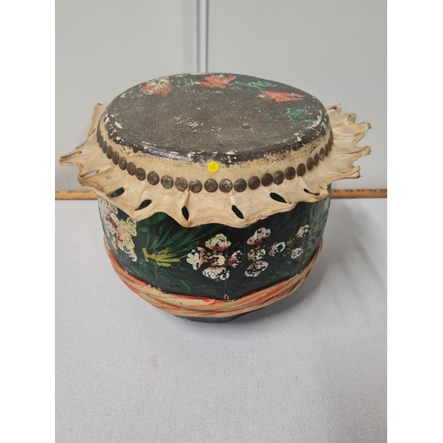 71 - Vintage tribal drum with hand painted floral design.
27cm x 38cm