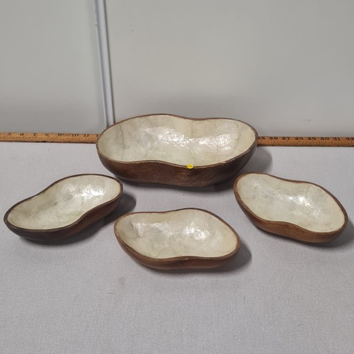 74 - Set of 4 wooden bowls with mother of pearl inlay.