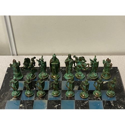 1 - Metal medieval style chess set on marble board.