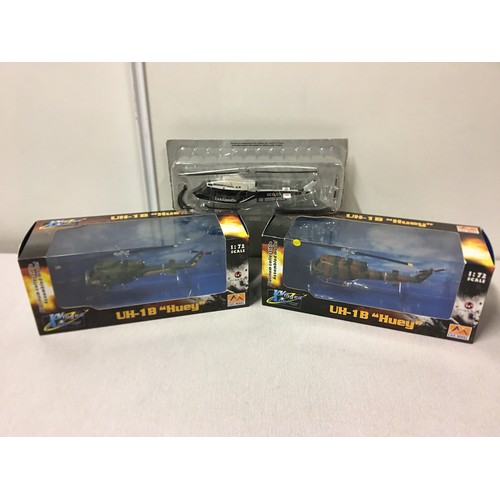 13 - 2 boxed Winged Ace Helicopter models 