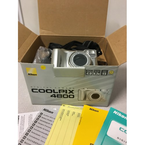 18 - Boxed Nikon Coolpix 4800 digital camera with leather case and charger etc.