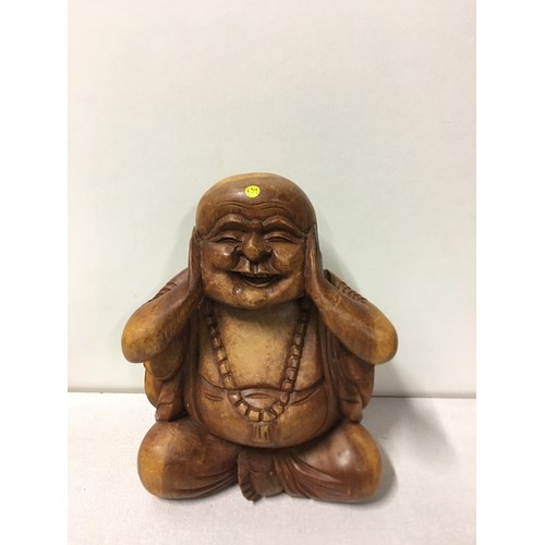 31 - Carved wooden Buddha figure.
26cm h