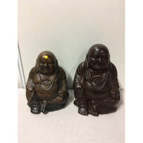 61 - 2 x ceramic Buddha ornaments.
Largest 24cm h