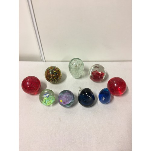 62 - Collection of glass paperweights to include Mdina etc.