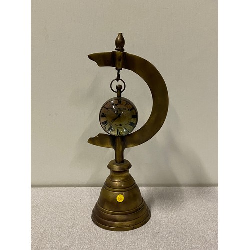 70 - Aéropostale Eye of time pocket watch/compass on brass stand.
27cm h