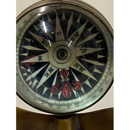 70 - Aéropostale Eye of time pocket watch/compass on brass stand.
27cm h