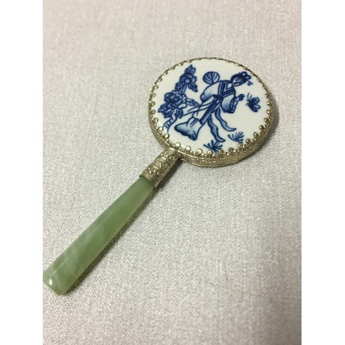 117 - 1950's Oriental hand mirror with Jade handle and blue and white porcelain back.