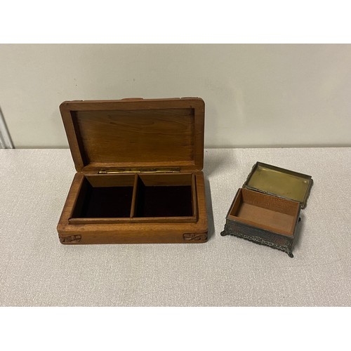 140 - Carved wooden box along with vintage metal trinket box.