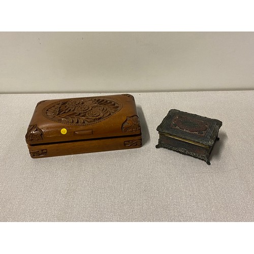 140 - Carved wooden box along with vintage metal trinket box.