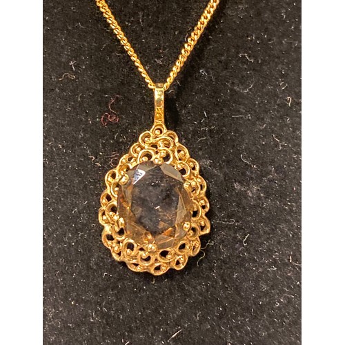 161 - 9ct gold and chain with 9ct gold and citrine pendant.