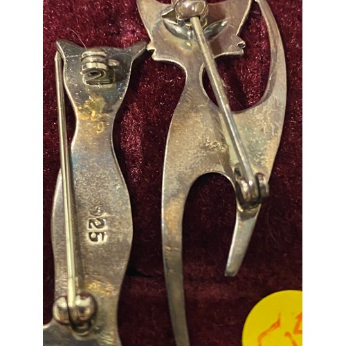 164 - 2 Silver cat brooches.