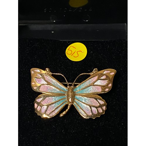 166 - Unmarked gold and enamel butterfly brooch.
