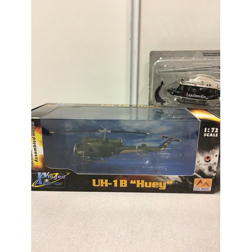 13 - 2 boxed Winged Ace Helicopter models 