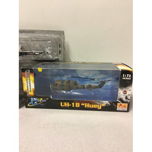 13 - 2 boxed Winged Ace Helicopter models 