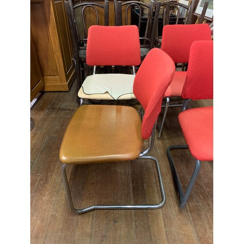 233 - Set of 4 1970 Remploy metal framed stacking chairs. Stamped to base.