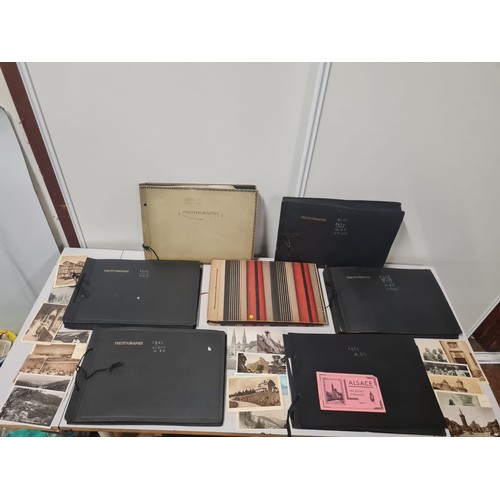 237 - 7 x photo albums filled with old photographs and postcards of Europe.