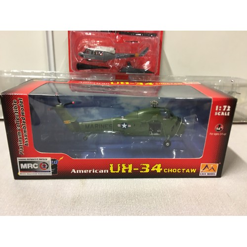 334 - 4 boxed helicopter models